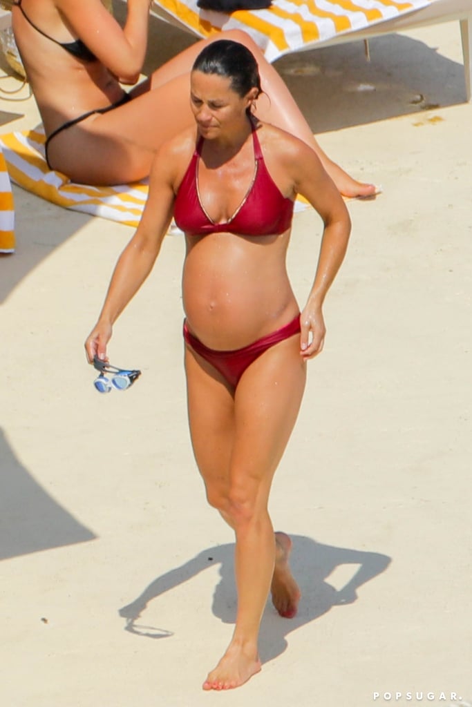 Pippa showed off her growing belly in a red bikini.