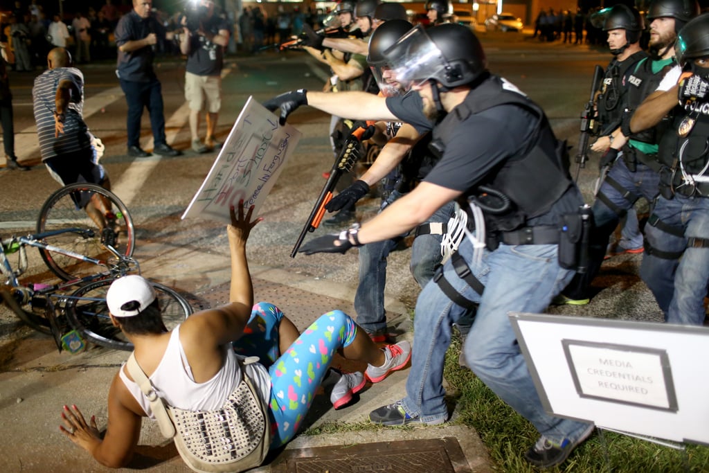 Officers arrested a demonstrator at gunpoint. Officers arrested a demonstrator at gunpoint.