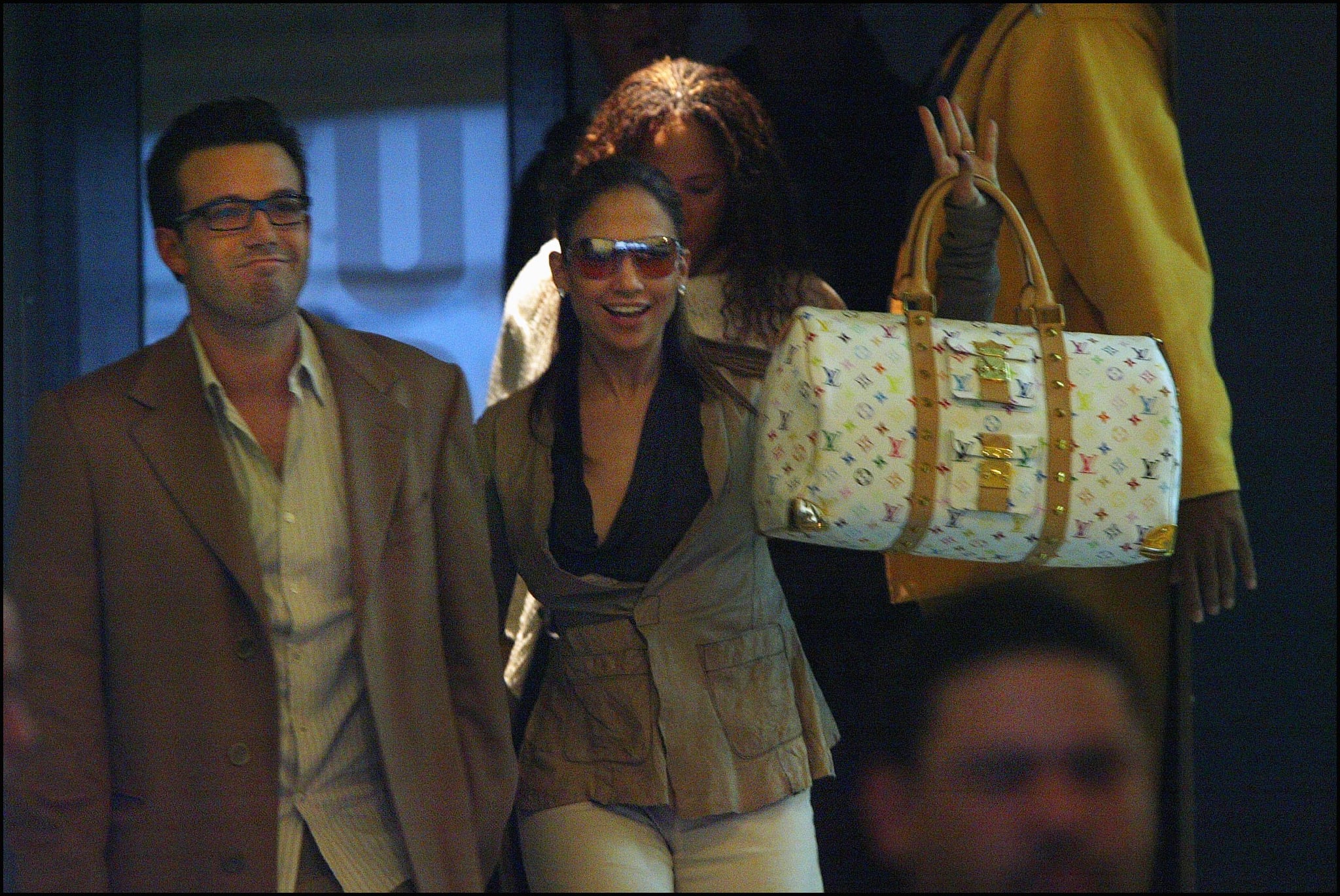 FRANCE - APRIL 08:  Jennifer Lopez and Ben Affleck shopping in Paris, France on April 08, 2003 - With Louis Vuitton bag.  (Photo by Pool LE FLOCH/TRAVERS/Gamma-Rapho via Getty Images)