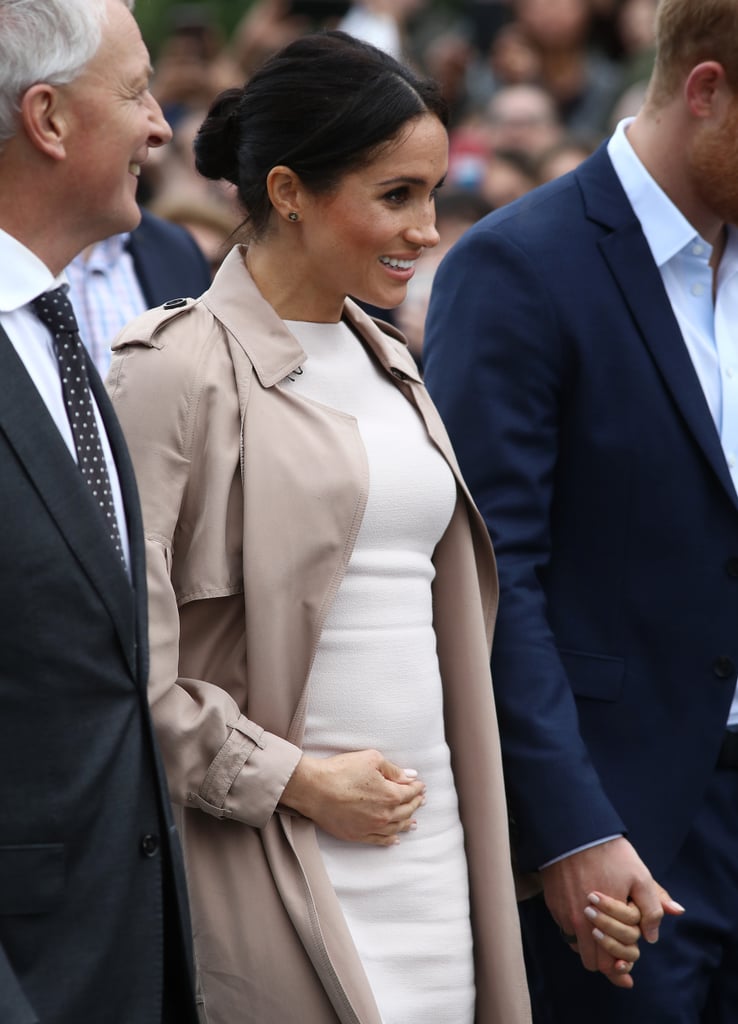 Meghan Markle Touching Baby Bump Pictures