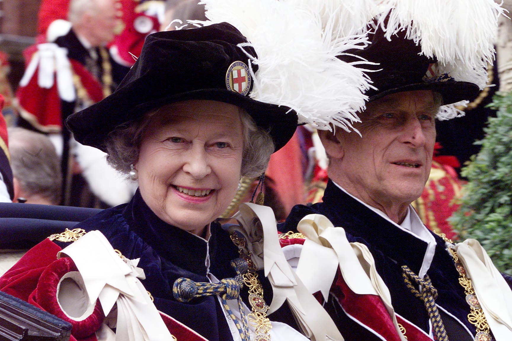 Queen Elizabeth II and Prince Philip leave a Garter ceremony in 1999