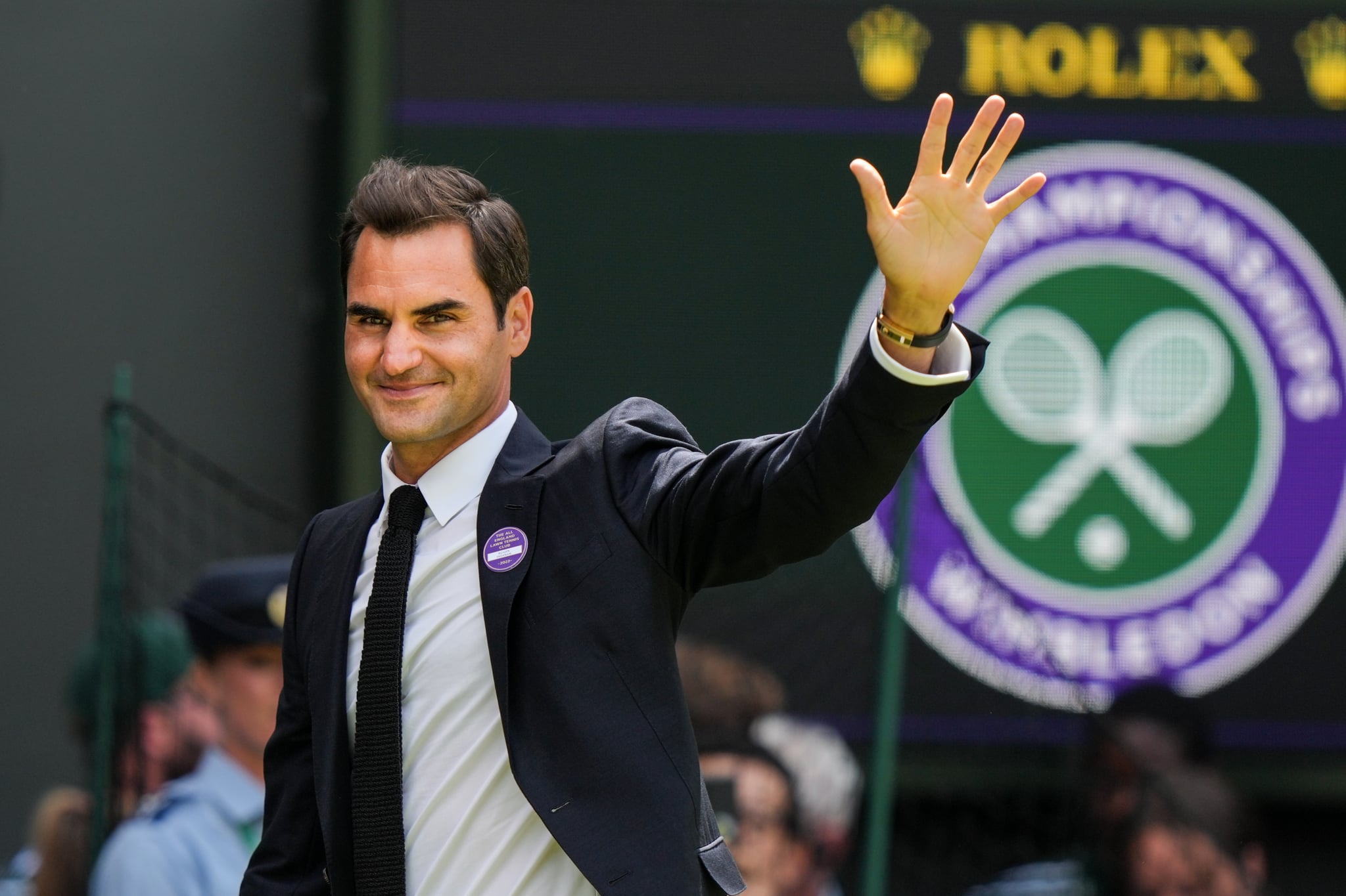 LONDON, ENGLAND - JULY 03: Roger Federer of Switzerland greets the audience during the Centre Court Centenary Celebration during day seven of The Championships Wimbledon 2022 at All England Lawn Tennis and Croquet Club on July 03, 2022 in London, England. (Photo by Shi Tang/Getty Images)