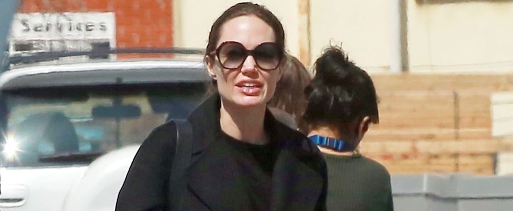 Angelina Jolie Wearing Black Trousers