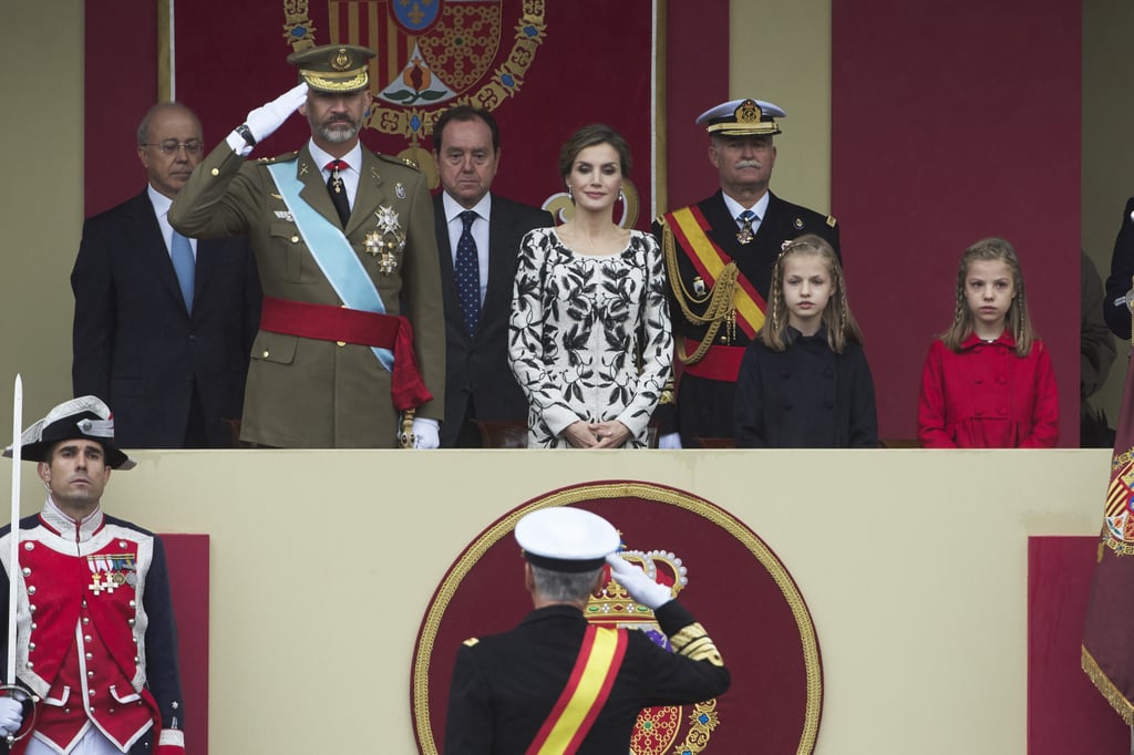 King Felipe VI, Queen Letizia, Princess Leonor, and Infanta Sofía attend Spain's National Day ceremonies.