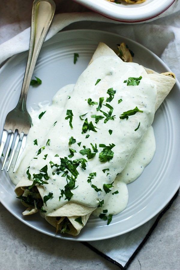 Spinach, Chicken, and Cheese Enchiladas With Jalapeño Cream Cheese Sauce