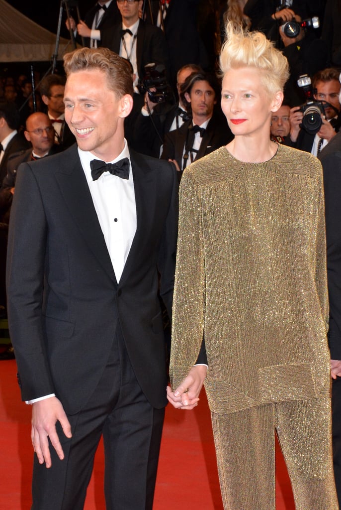 Tom escorted Tilda Swinton down the red carpet.