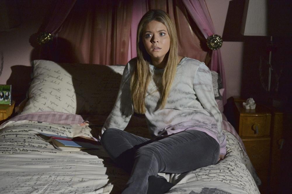 Alison wakes up, alarmed.