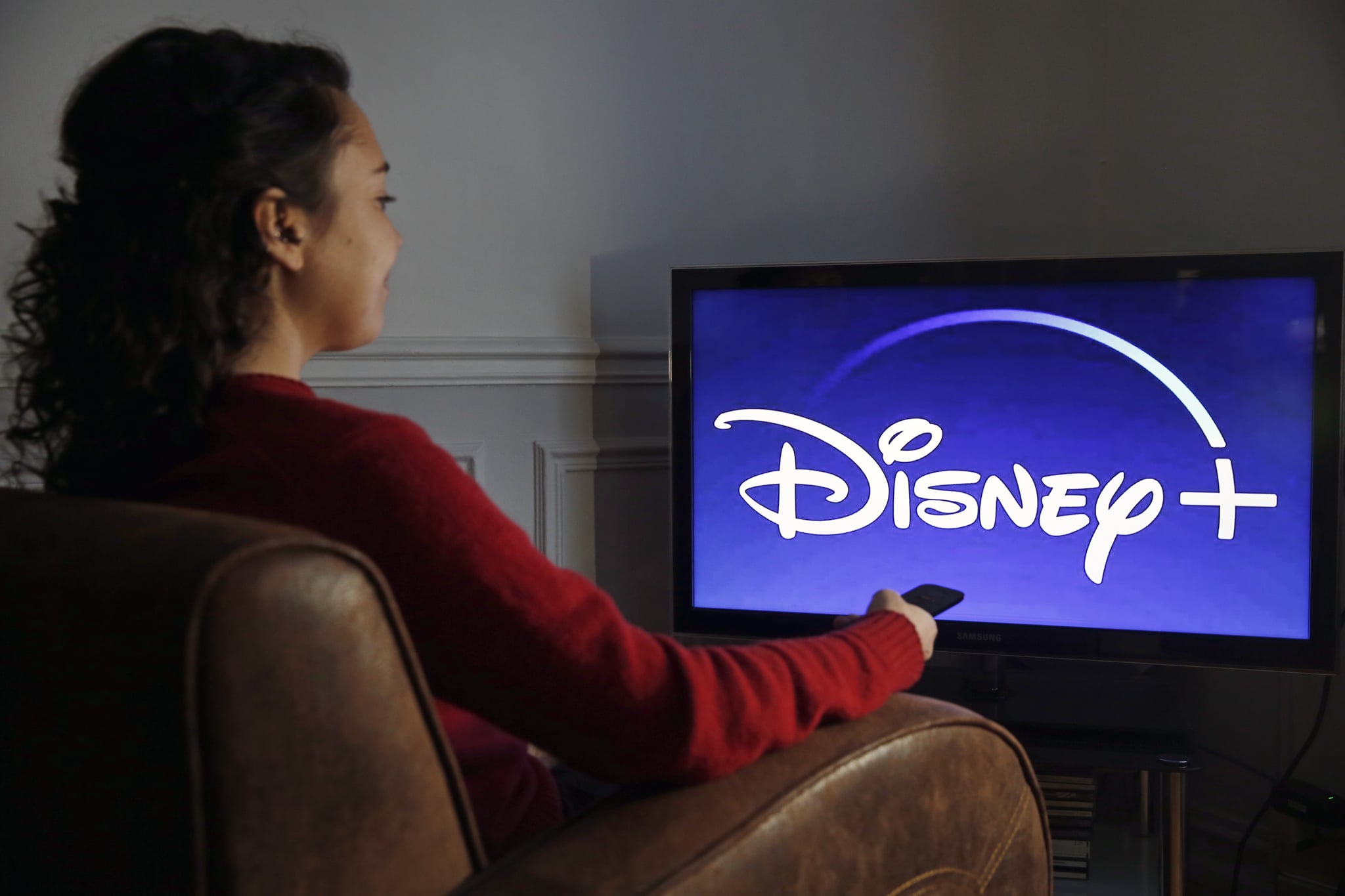 PARIS, FRANCE - DECEMBER 26: In this photo illustration, the Disney + logo is displayed on the screen of a TV on December 26, 2019 in Paris, France. The Walt Disney Company launched its Disney + Streaming Service (Svod) in the United States on November 12, 2019. A month after its launch, Disney Plus has registered 24 million subscribers in the United States, which is very much higher than the forecasts and ambitions of the group, which targeted 20 million subscribers worldwide in 2020.  (Photo by Chesnot/Getty Images)