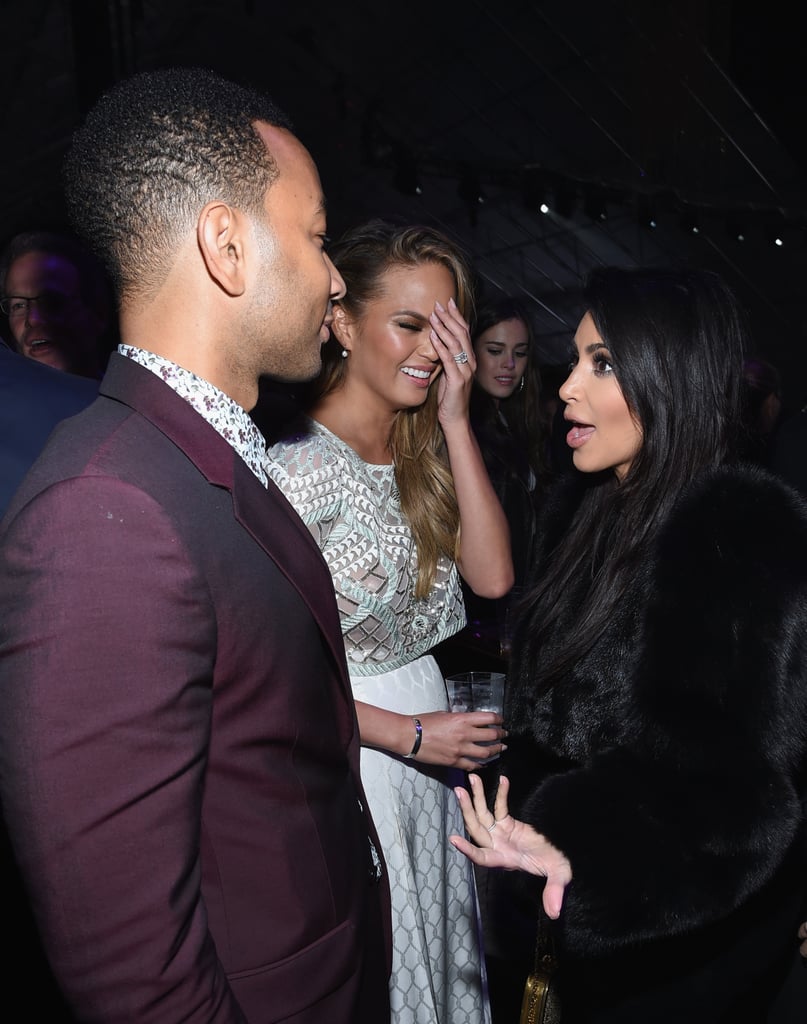 John Legend, Chrissy Teigen, and Kim Kardashian chatted at the  DirecTV Super Saturday Night party.