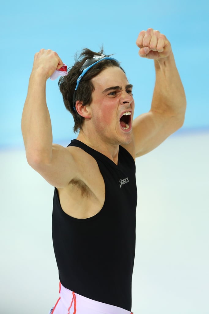 Speed skater Jan Smeekens of the Netherlands flexed and cheered after winning the silver medal in the men's 500-meter event.