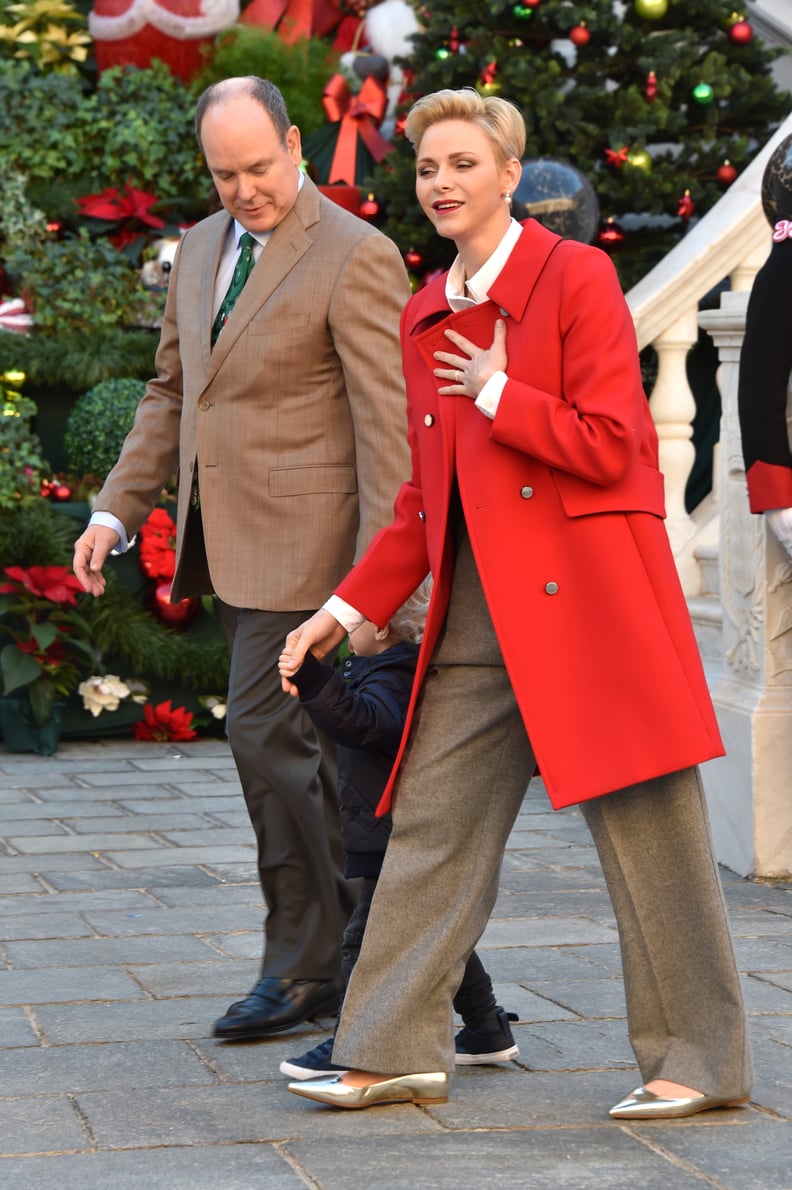 Princess Charlene Stepped Out in a Festive Outfit Complete With a Red Coat