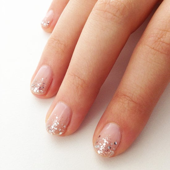 Try this minimalist approach to sparkling nail art for a fancy night out.