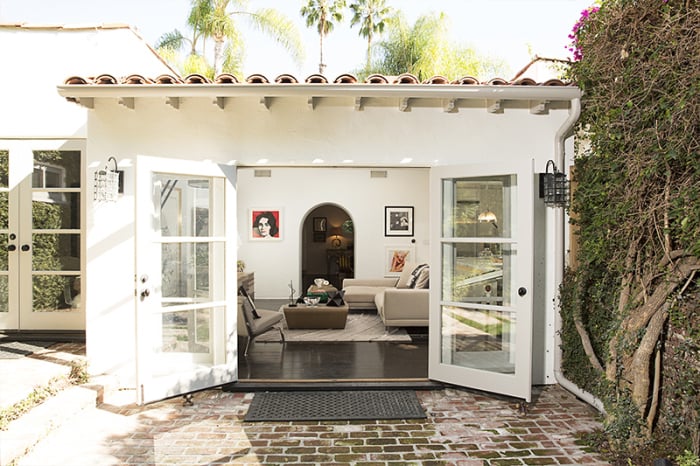 French doors open to the outside, where there's a built-in fireplace and cabana.
Source: Bradley Meinz for Rodeo Realty