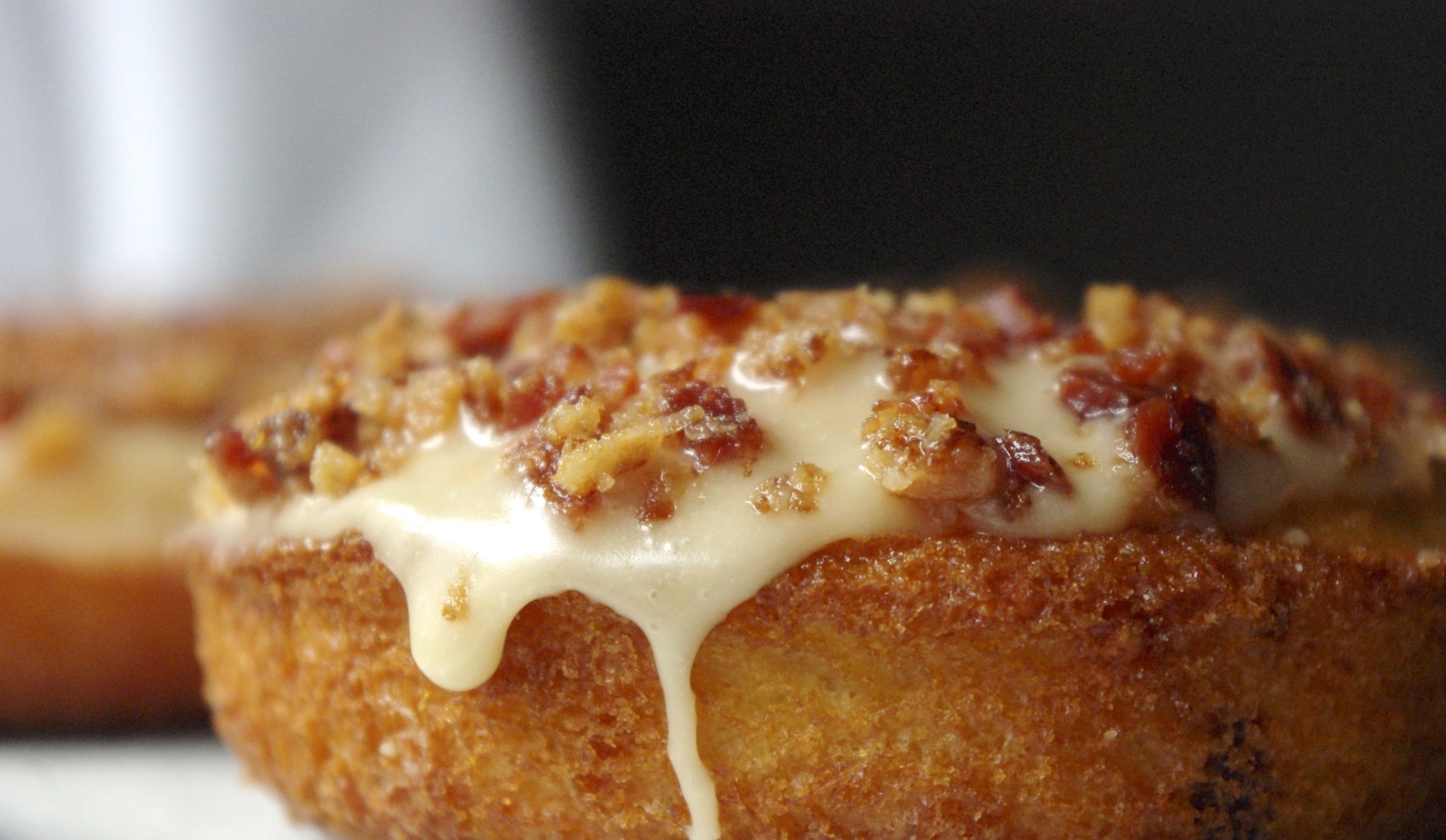 Cheddar Onion Doughnut with Maple Glaze and Bacon