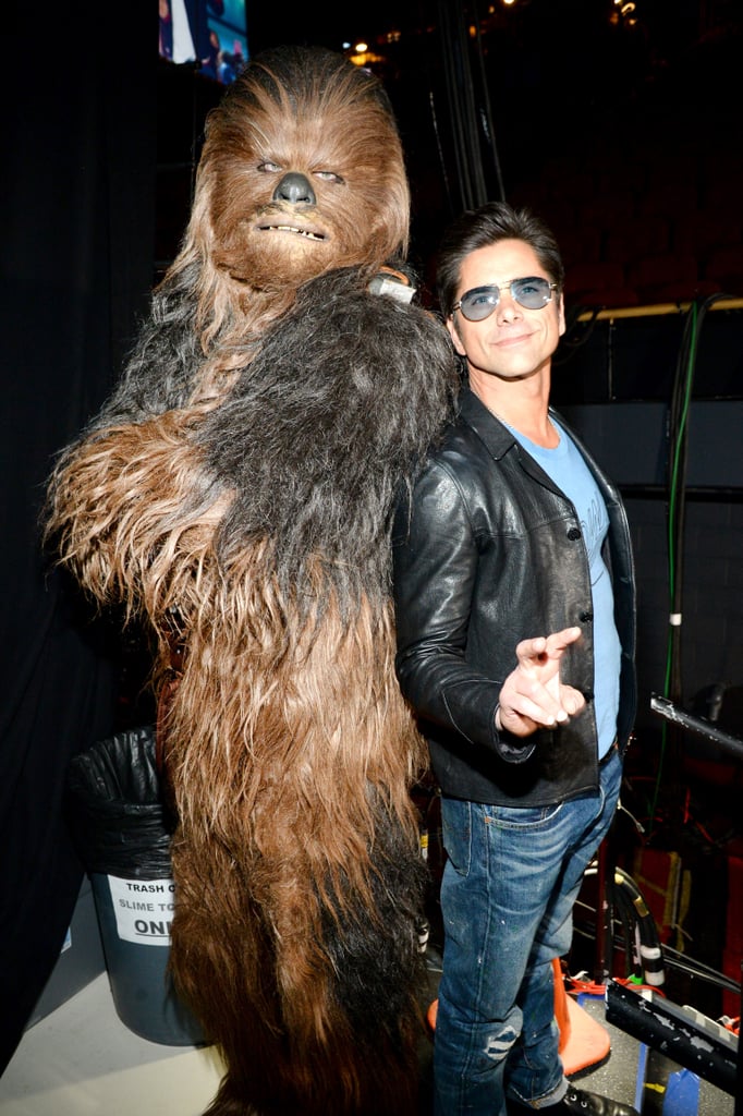 Pictured: John Stamos and Chewbacca