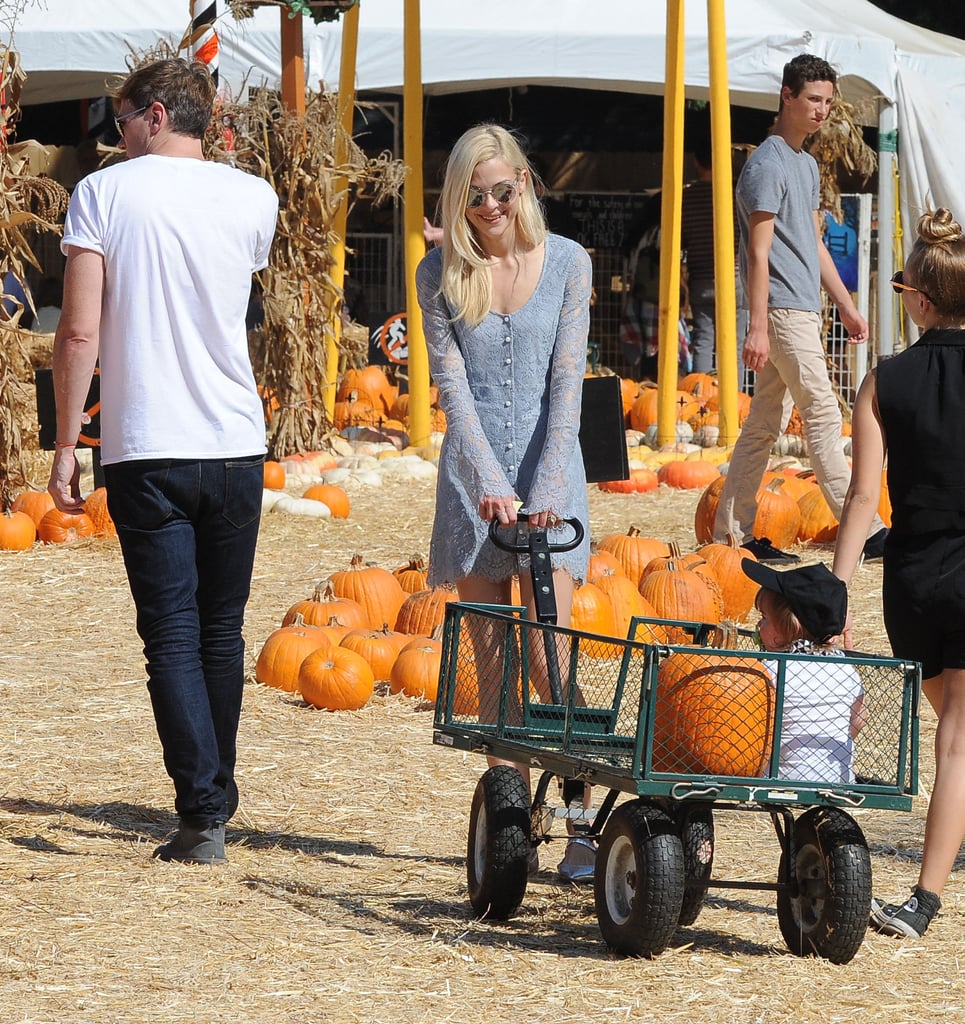 Jaime King pulled her son, James, around Mr. Bones pumpkin patch in a wagon.