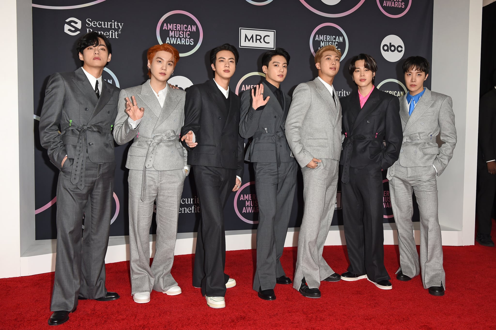 LOS ANGELES, CALIFORNIA - NOVEMBER 21: (L-R) V, Suga, Jin, Jungkook, RM, Jimin, and J-Hope of BTS attend the 2021 American Music Awards at Microsoft Theatre on November 21, 2021 in Los Angeles, California. (Photo by Axelle/Bauer-Griffin/FilmMagic)