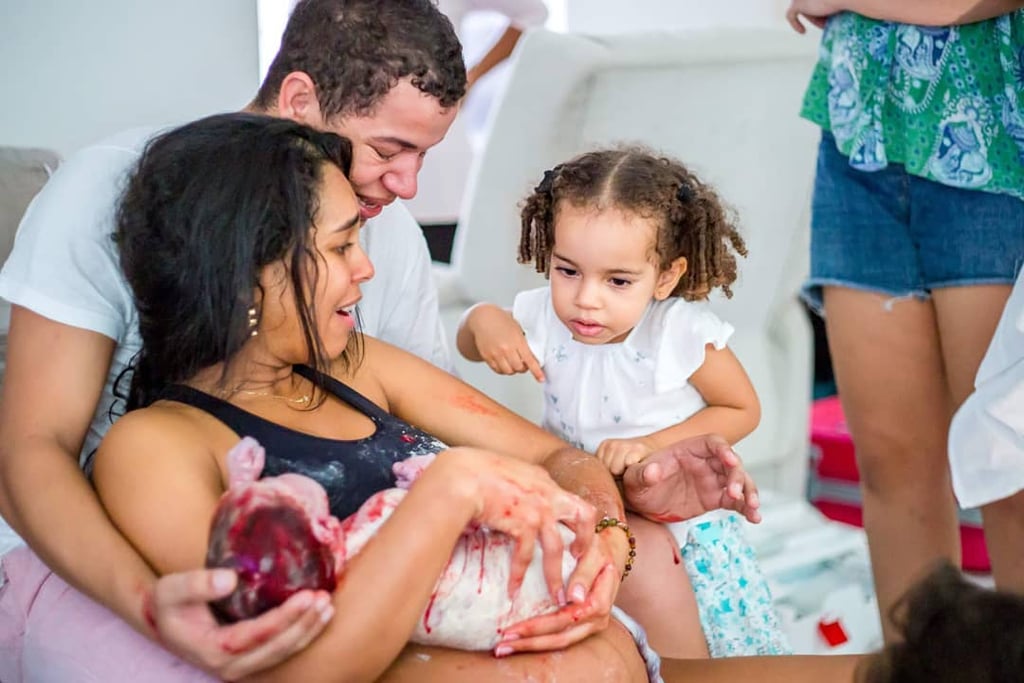 Photographer's Series of a Big Sister at Her Mom's Birth