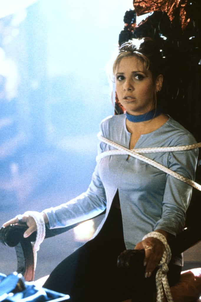 A cardigan and a choker necklace = a '90s-outfit masterpiece.