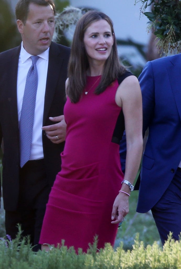 Jennifer Garner, also a guest at Kimmel's nuptials, opted for a berry-hued sheath dress featuring a black panel in the back.