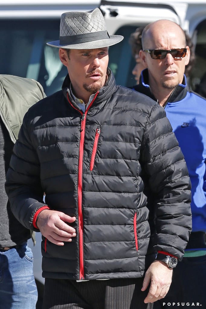 Kevin Dillon wore a had and a puffy jacket on set.