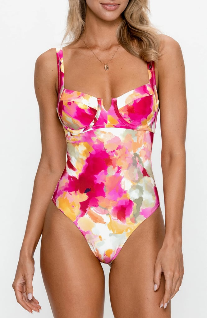 PS by Cupshe Underwire Cheeky One-Piece Swimsuit ($75)
Looking for a bit more support from your swimwear? This suit has underwire at the bust to resemble a bra. From the bright floral print to the back-hook closure, this one-piece is the perfect way to feel bold and comfortable for a beach day.