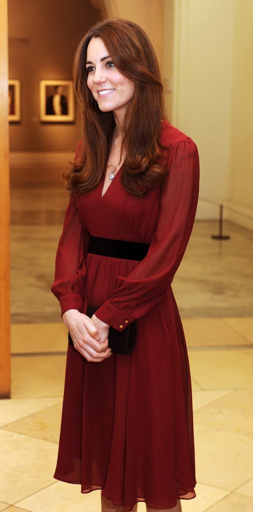 At the unveiling of her first portrait, Kate selected a deep-red Whistles dress for $133. She had previously worn it for a trip to Copenhagen and later on an engagement to Newcastle.