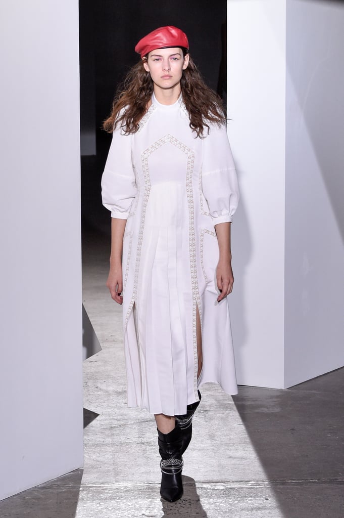 We can imagine Kate taking on a daytime event in this three-quarter bishop-sleeved dress. Perhaps she'd tweak the look to omit both slits, but the cold shoulder detail and intricate trim would still stand out. We can imagine Kate taking on a daytime event in this three-quarter bishop-sleeved dress. Perhaps she'd tweak the look to omit both slits, but the cold shoulder detail and intricate trim would still stand out.