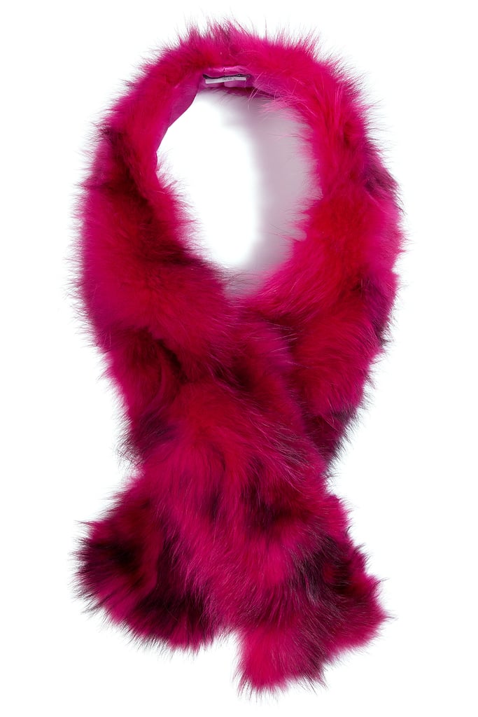 Winter has kicked into high gear, which means my bold brights have been replaced with moody hues and dramatic prints. What better way to boost my spirits, and keep me cozy, than this racoon fur scarf by Steffen Schraut ($270)?
— MV