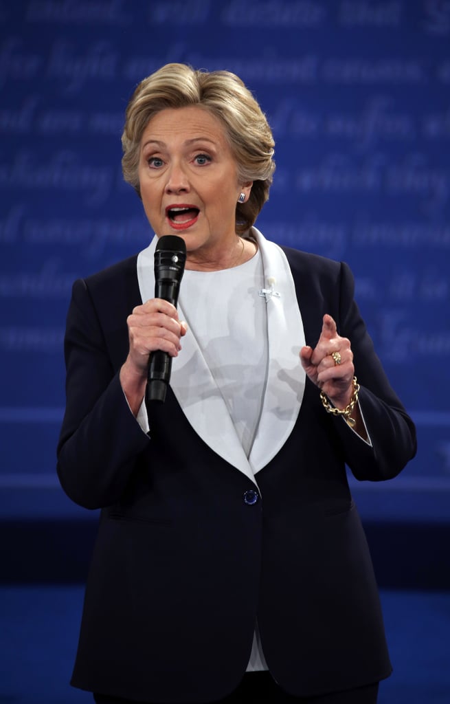 Hillary also accessorized with one chunky chainlink bracelet and a matching ring.