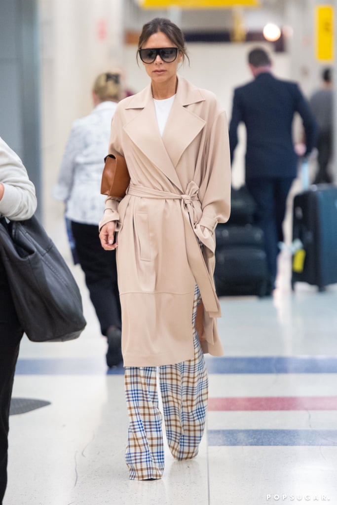 Victoria Beckham in Trench Coat and Plaid Pants