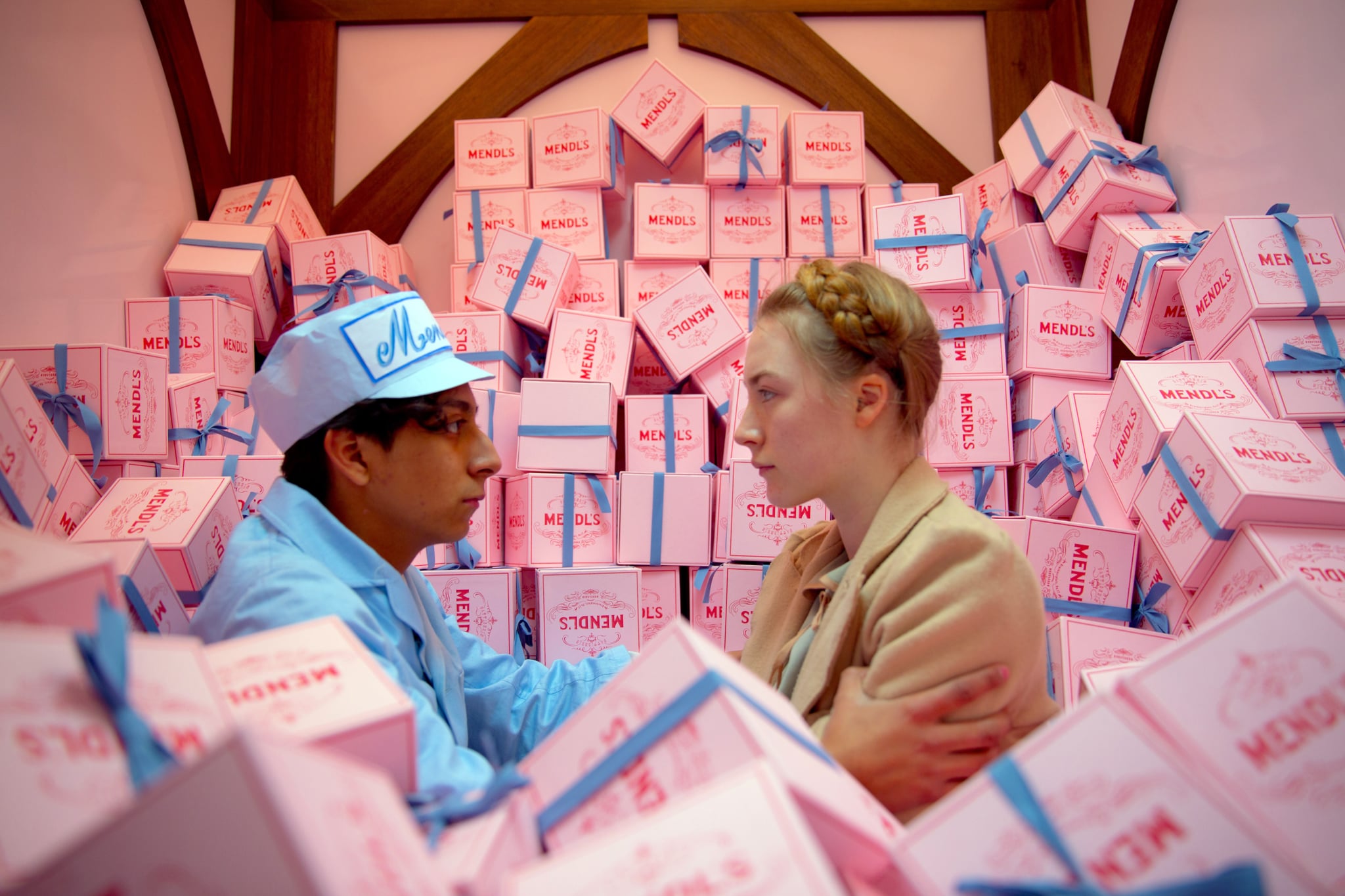 THE GRAND BUDAPEST HOTEL, from left: Tony Revolori, Saoirse Ronan, 2014. ph: Martin Scali/TM and Copyright Fox Searchlight Pictures. All rights reserved./courtesy Everett Collection