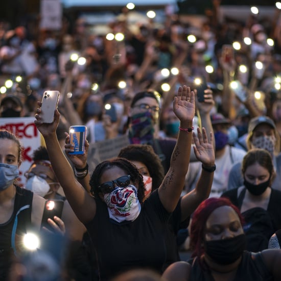 Watch Washington DC Protesters Sing "Lean on Me" | Video