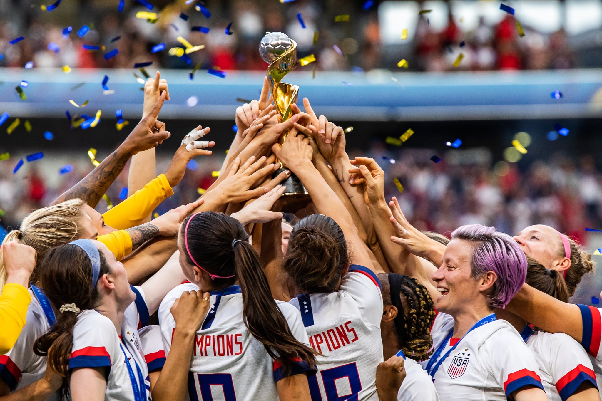 STADE DE LYON, LYON, FRANCE - 2019/07/07: USA women's national team celebrating with trophy after the 2019 FIFA Women's World Cup Final match between The United States of America and The Netherlands at Stade de Lyon.(Final score; USA - Netherlands 2:0). (Photo by Mikoaj Barbanell/SOPA Images/LightRocket via Getty Images)