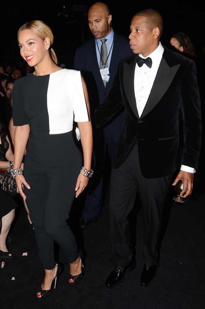 Beyoncé was on trend in a black-and-white Osman jumpsuit and JAY-Z was polished in a black tuxedo at the 2013 Grammy Awards.