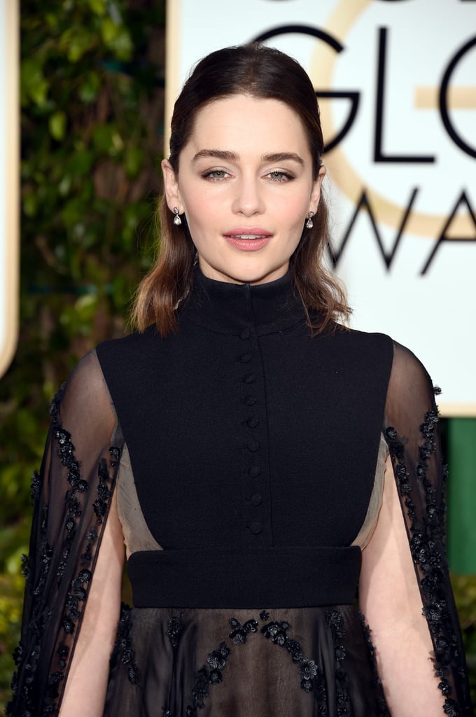 As for earrings, Emilia kept it simple, wearing a small drop pair that went perfectly with her gown.