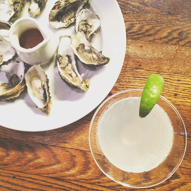 Eat oysters and sip on cocktails for happy hour.