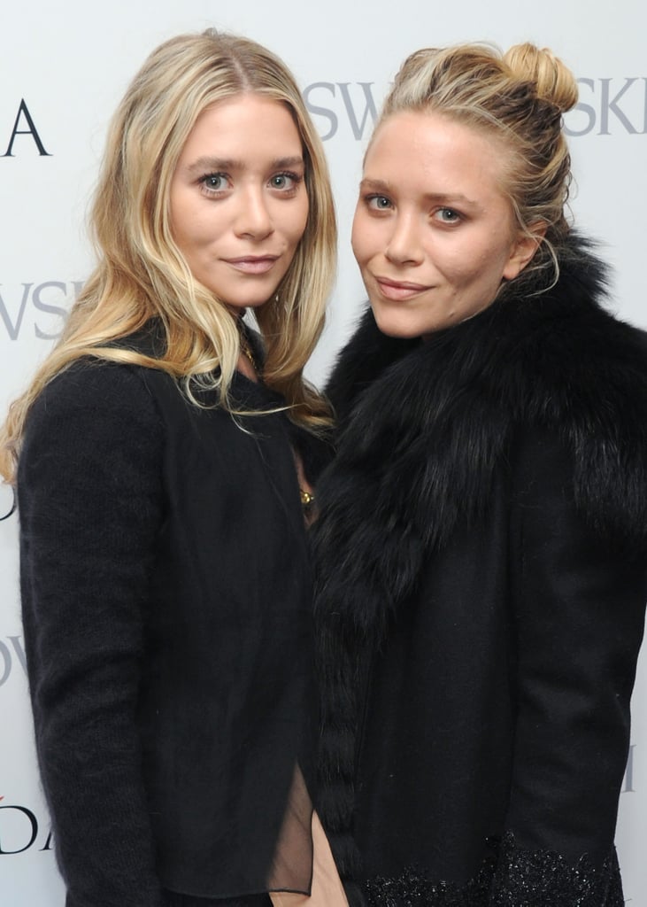 At the 2013 CFDA Award nominations, Ashley and Mary-Kate both had light blond hair, which they paired with a nude makeup palette. Ashley wore her hair down in waves, while Mary-Kate opted for a chic topknot.