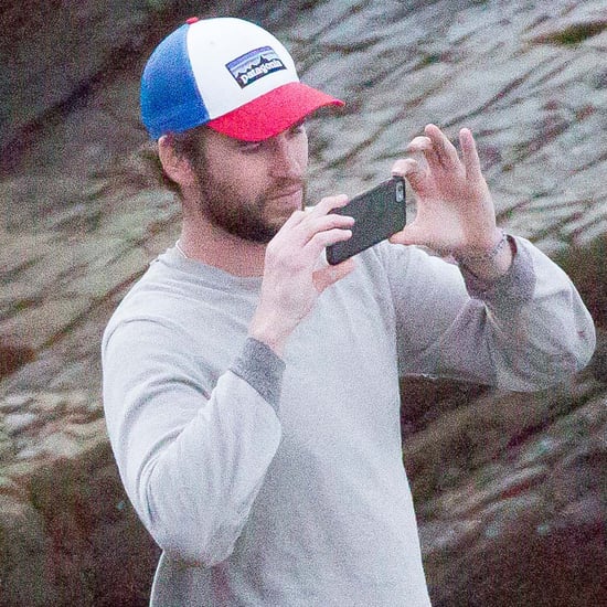 Liam Hemsworth Taking Pictures of Chris Surfing in Australia