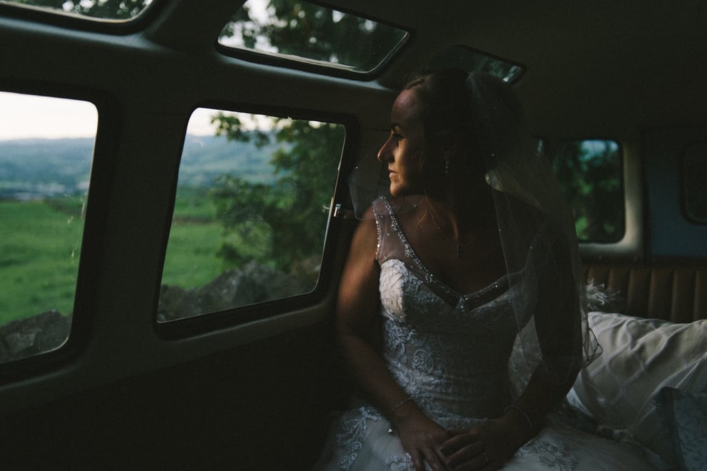 "Shortly after finishing Anthony and Natalie's portraits in a beautiful pasture in the English countryside, we hopped in a 1967 VW bus. As we were heading out, Natalie took a quiet moment for herself, reflecting on the day thus far and looking forward to what will come." — John Schnack