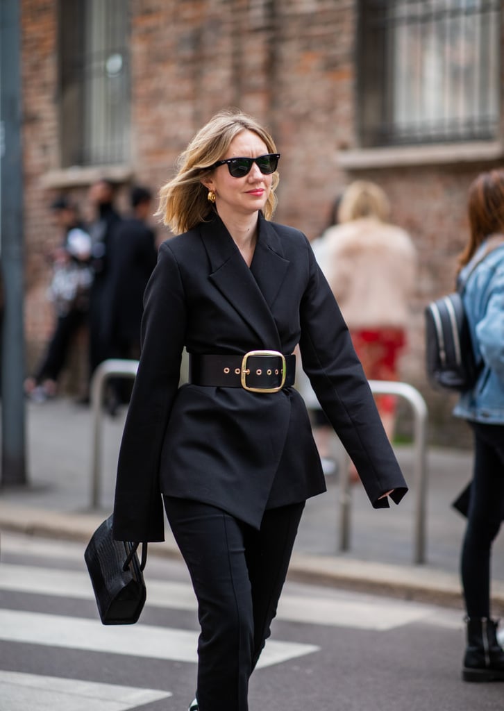 Black on black is anything but boring when an oversized buckle in sleek gold is part of the equation.
