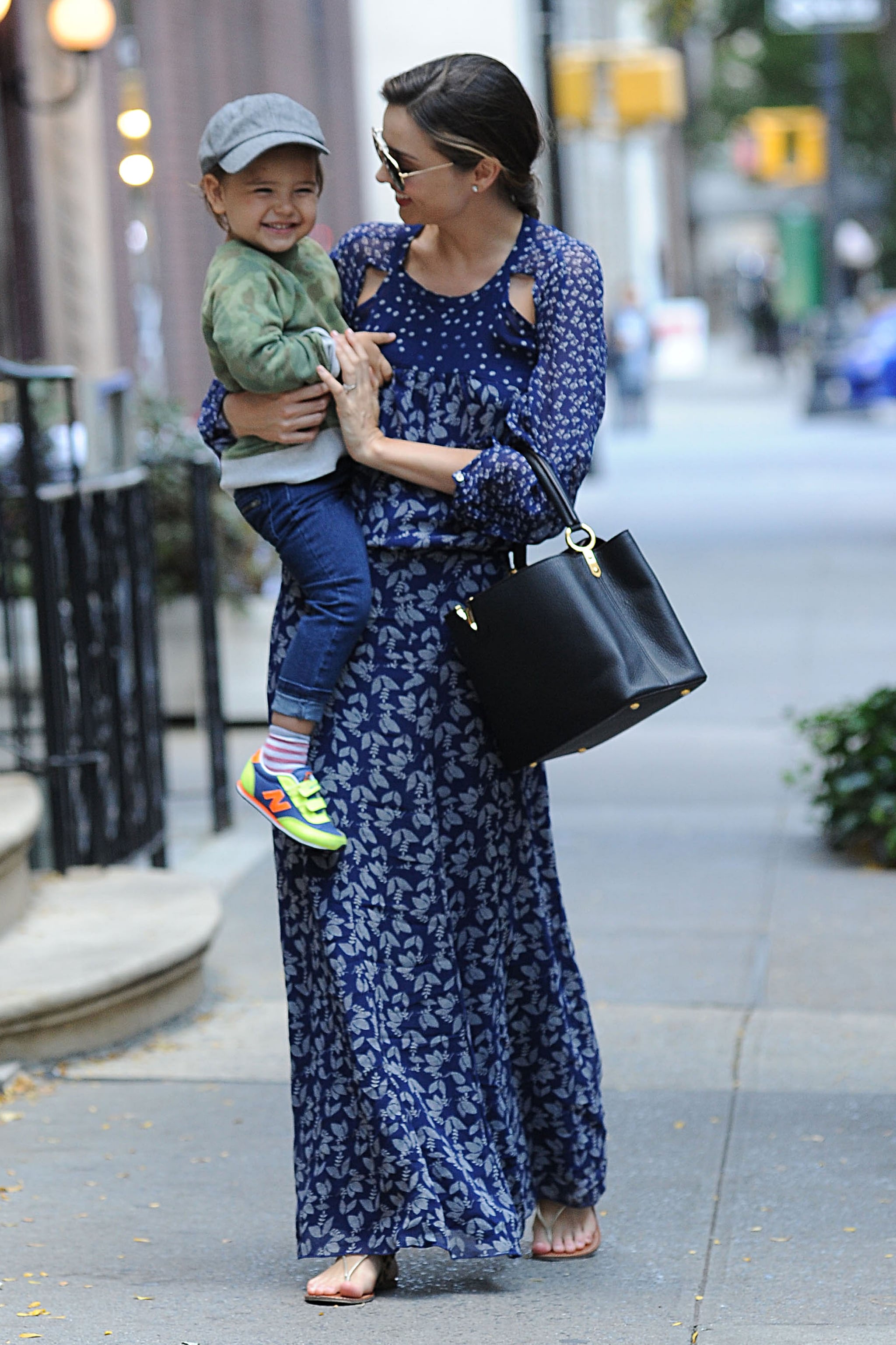 Miranda Kerr Caps a Casual Summer Outfit With a Tiny Louis Vuitton