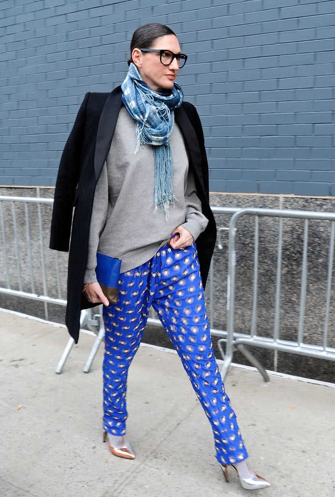 To catch the Altuzarra Fall 2014 show, she looked like she could've stepped straight off the pages of a J.Crew catalog thanks to the printed pajama-style pants, cozy sweater, and pumps layered with warm socks.