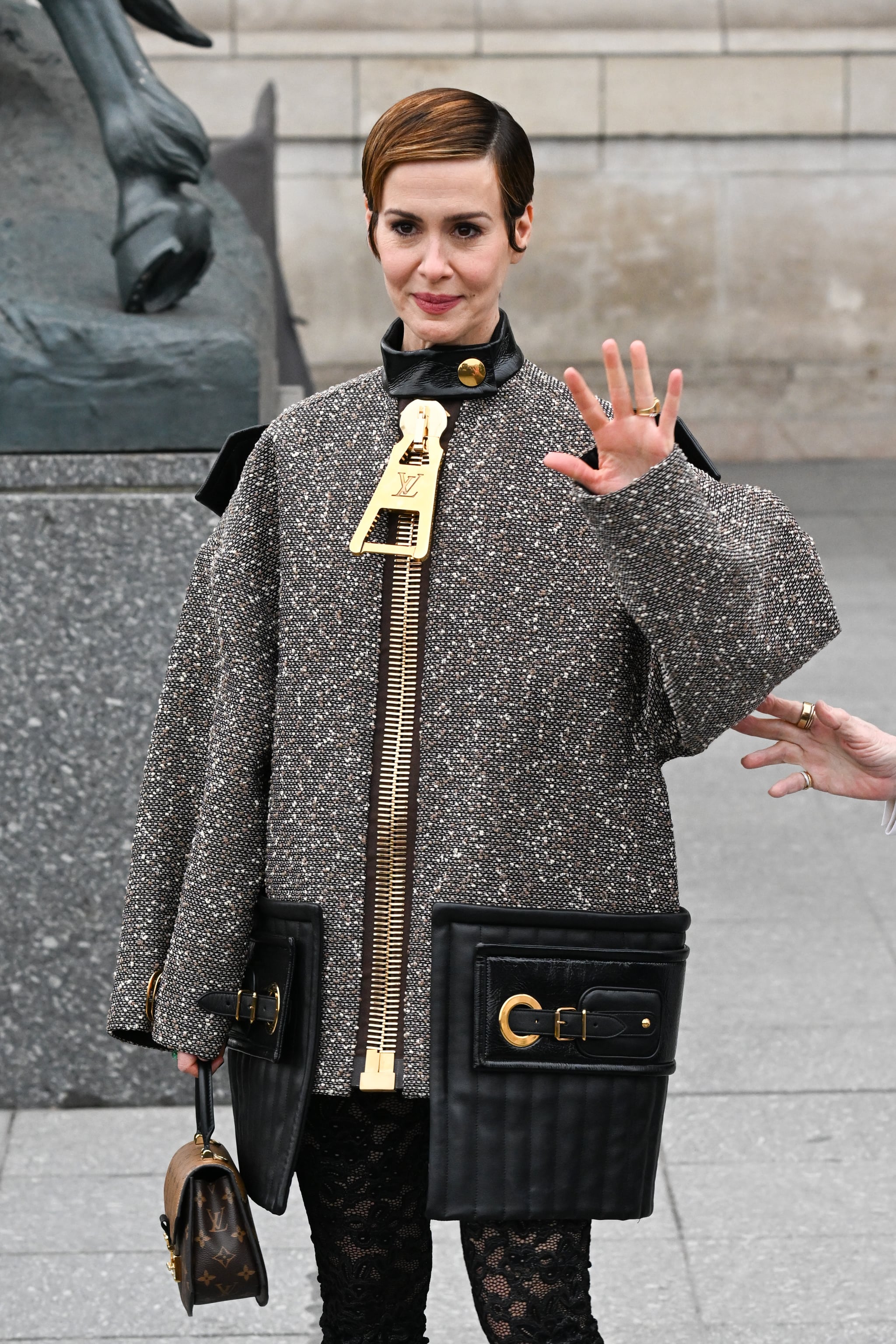 Sarah Paulson Zips Into Supersized Jacket & Booties for Louis