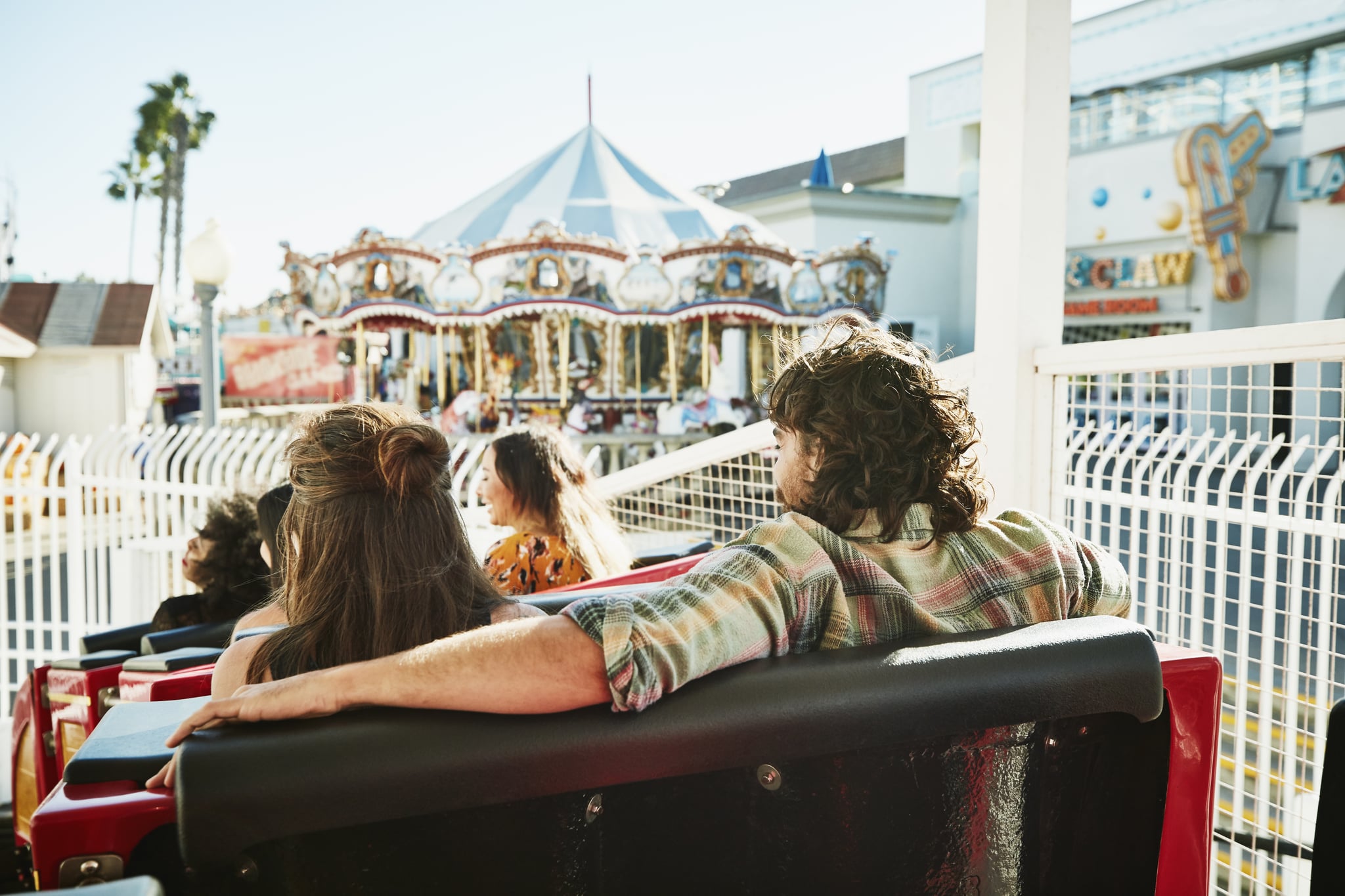 Image of a Couple on a Rollercoaster From Behind