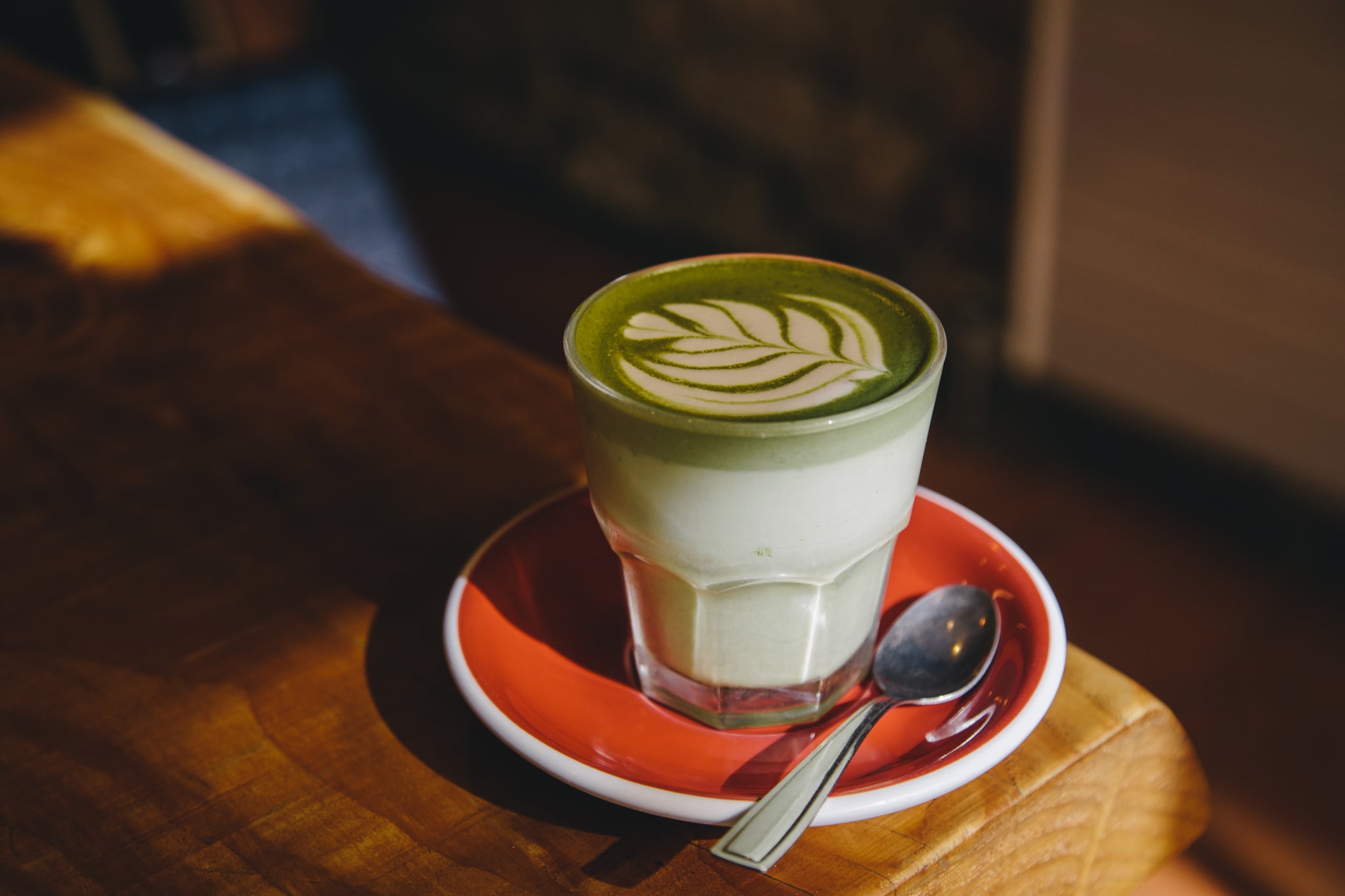 Matcha latte in a glass.