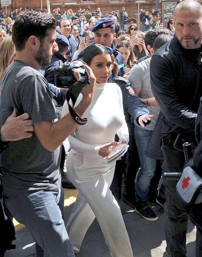Kim Kardashian With Cutout of Rob Kardashian's Face