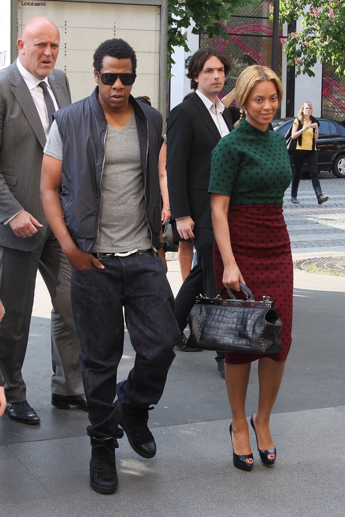 Beyoncé was ladylike in a polka-dot Marc Jacobs dress while JAY-Z stayed cool in a vest and black sneakers in Paris in 2011.