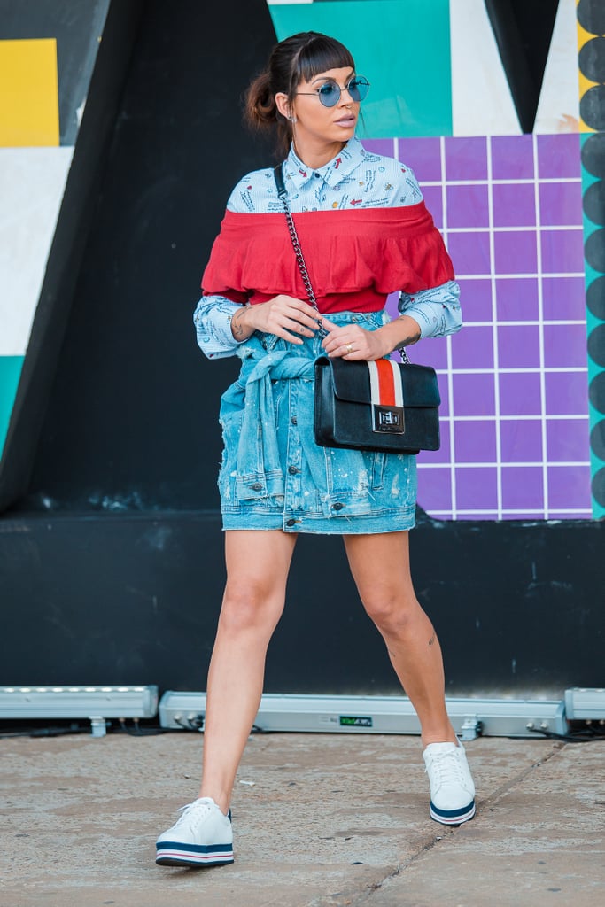 Shop for a deconstructed denim skirt that appears to be a jean jacket tied around the waist. Style it with platform sneakers.