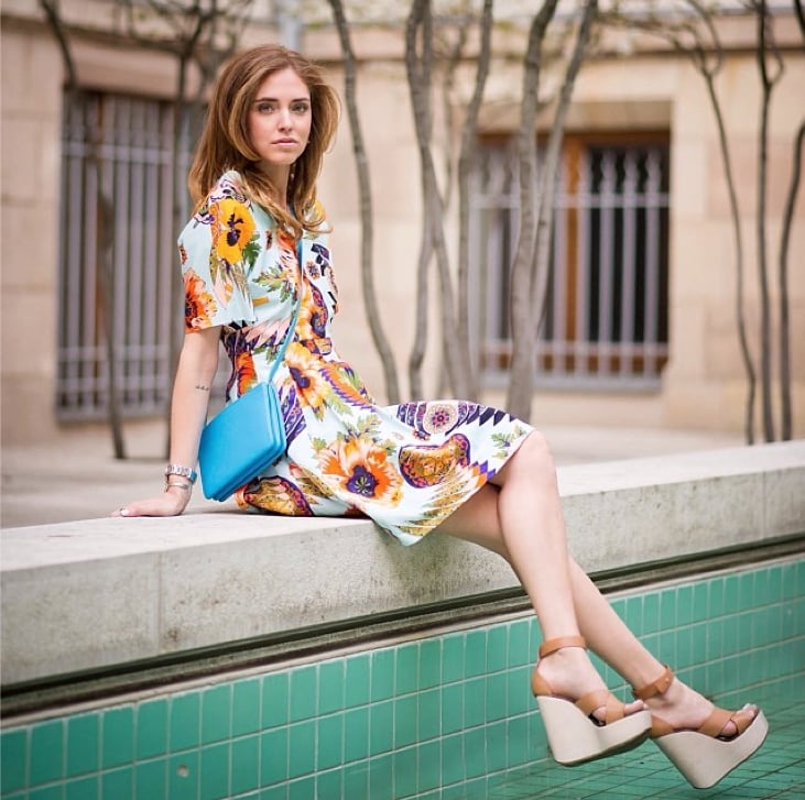 A printed sundress and neutral wedges is a no-fail option for a pretty outdoor ceremony. 
Source: Instagram user chiaraferragni